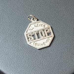 Vintage sterling silver pendant charm. “I’ll never stop loving you”